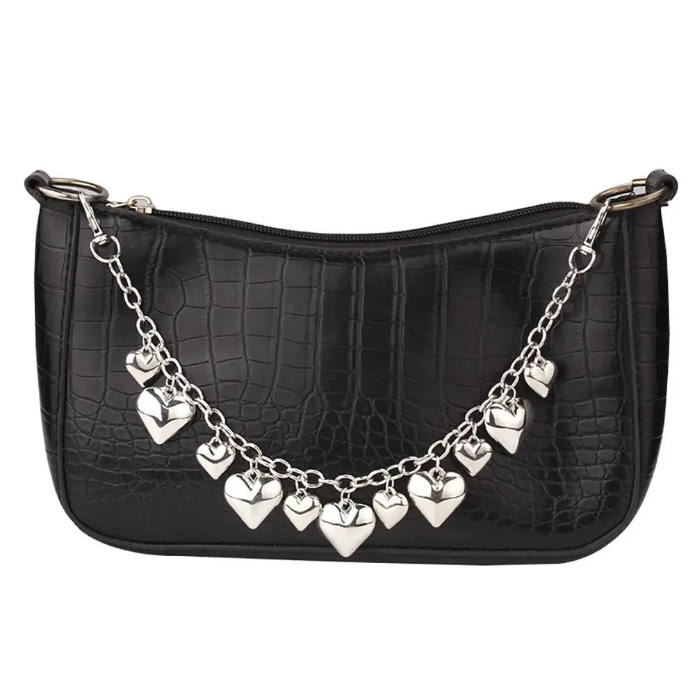 SUVETTE silver heart chain on black handbag