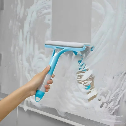 SUVETTE 2-in-1 blue glass squeegee cleaning a soapy mirror