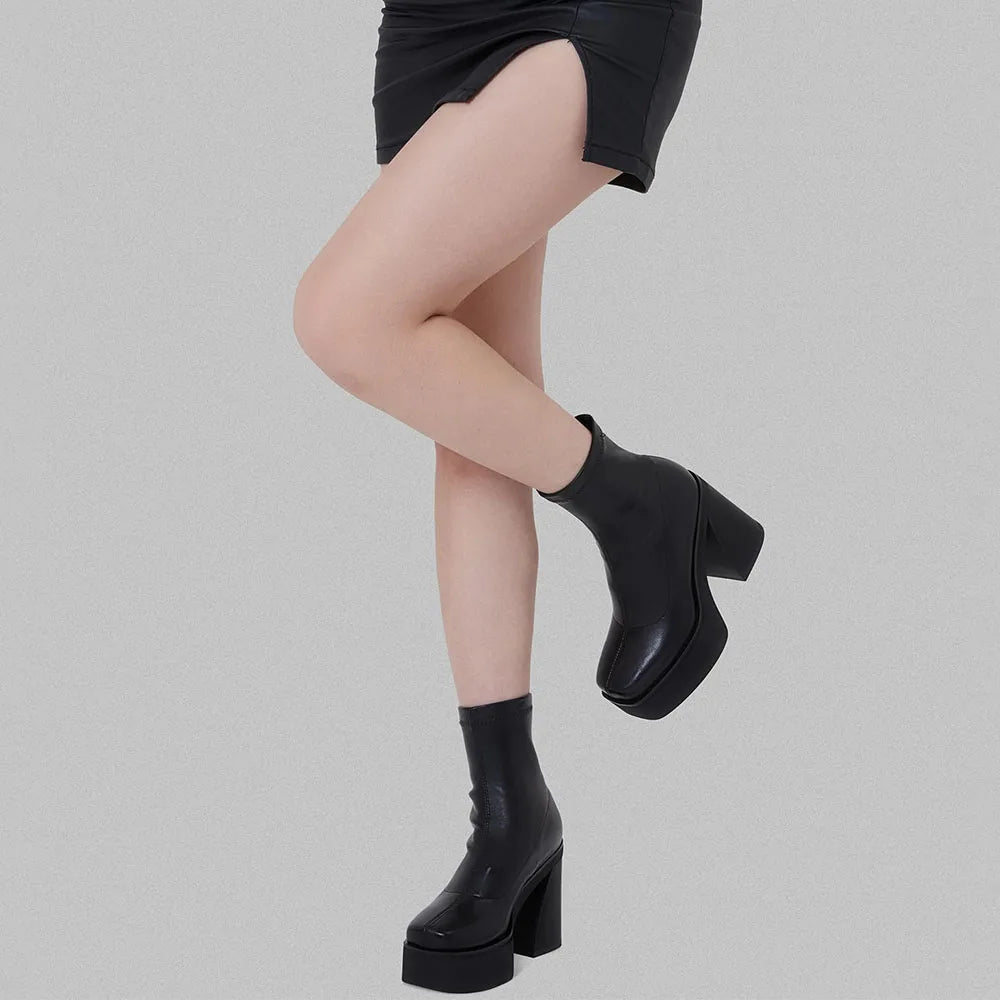 SUVETTE black platform ankle boots model pose