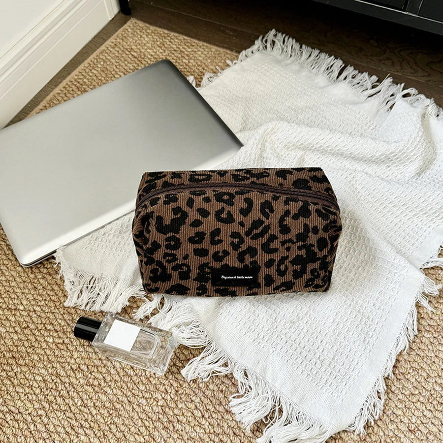 SUVETTE leopard print makeup pouch setup