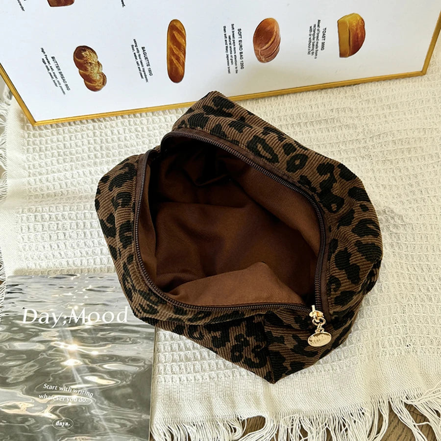 SUVETTE open leopard print makeup bag interior