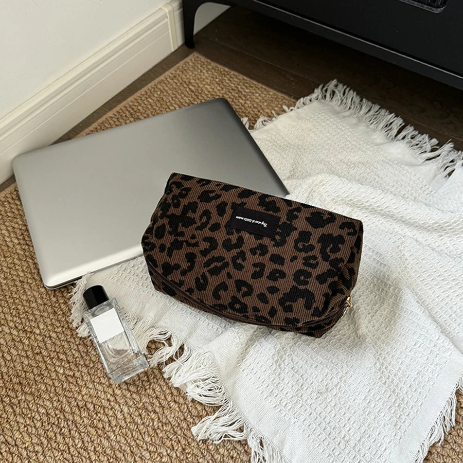 SUVETTE leopard print makeup pouch setup
