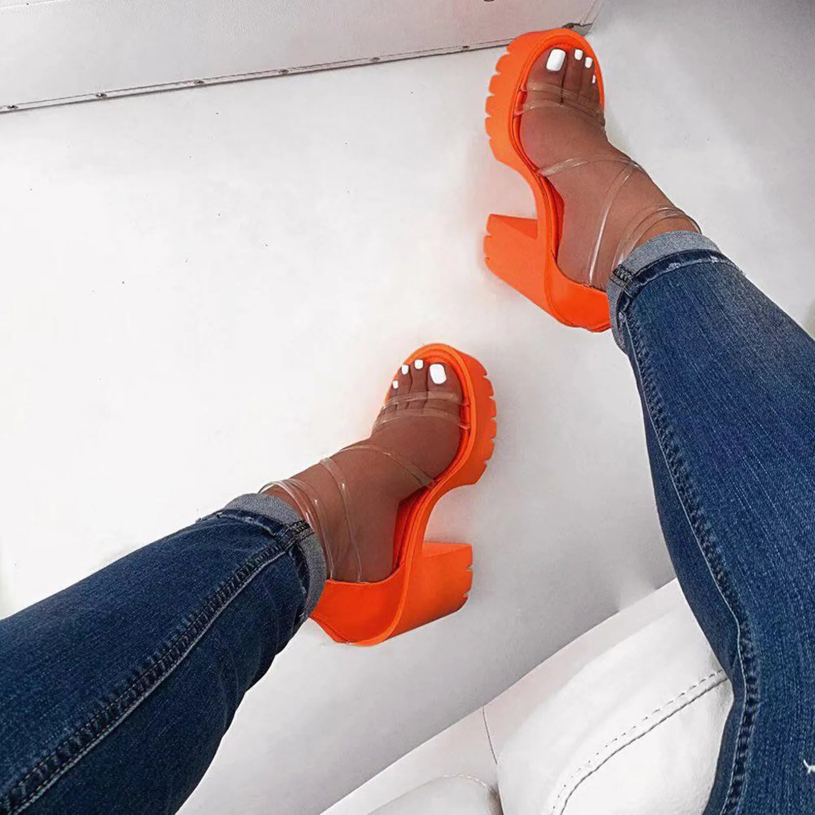 SUVETTE orange platform heels worn with jeans